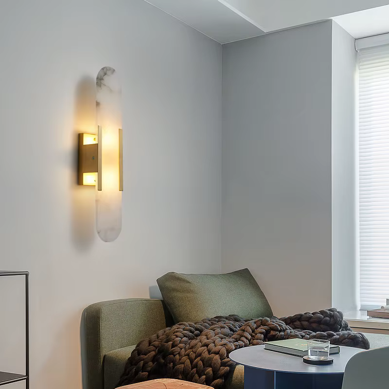مصباح جداري LED بيضاوي الشكل بلمسة نهائية ذهبية عصرية ولوحة رخامية بيضاوية الشكل مع قاعدة رخامية